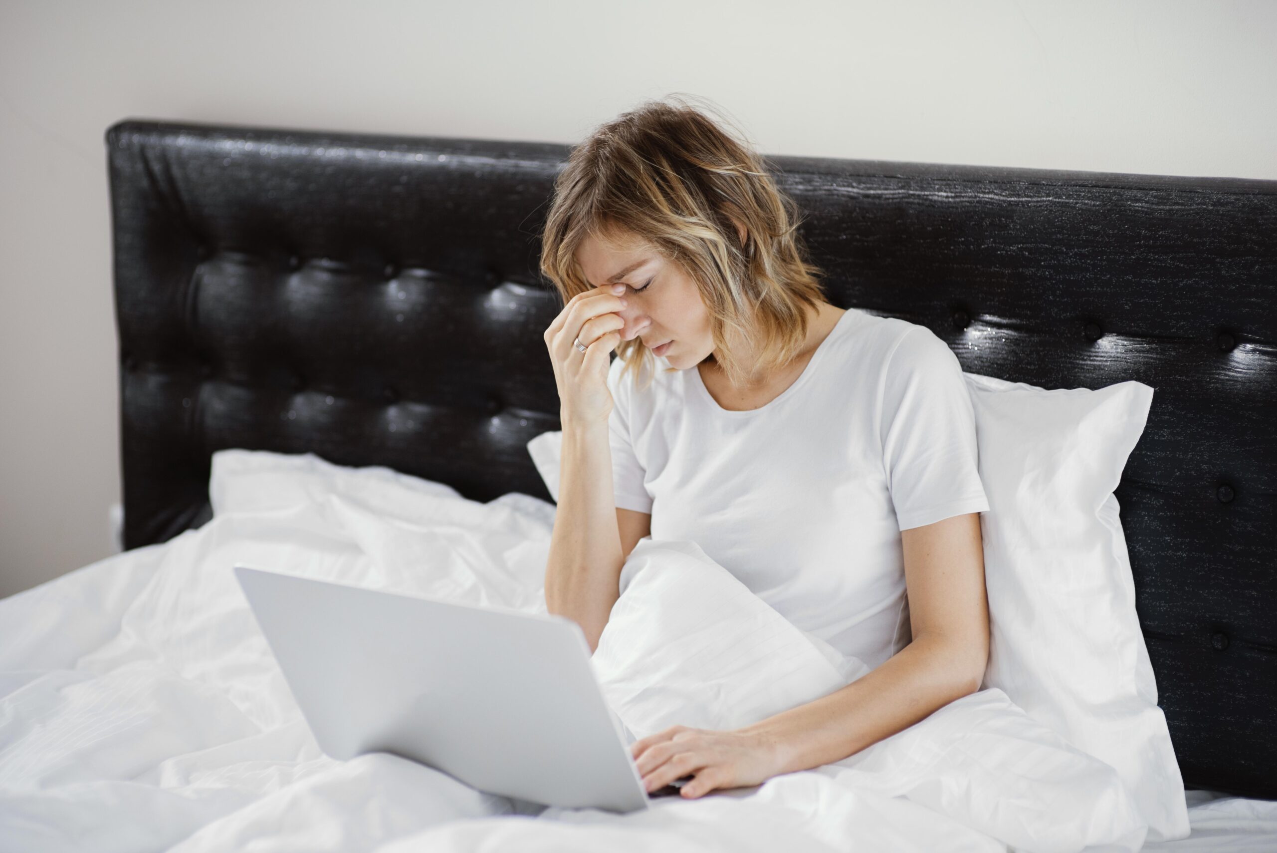 Woman Bed Using Laptop Scaled